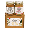 Jar of Chocolate Sea Salt Almond Butter next to a jar of Fiji Ginger Almond Butter on top of a gift for you box