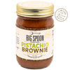 Jar of Big Spoon Roasters Pistachio Brownie almond butter with gold lid on a white background