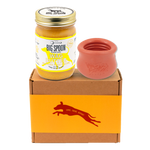 Jar of 'Big Spoon Roasters' Wag Butter with an red west paw toppl on a branded box.