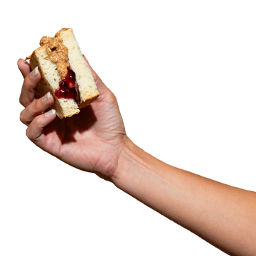 hand holding AB&J sandwich