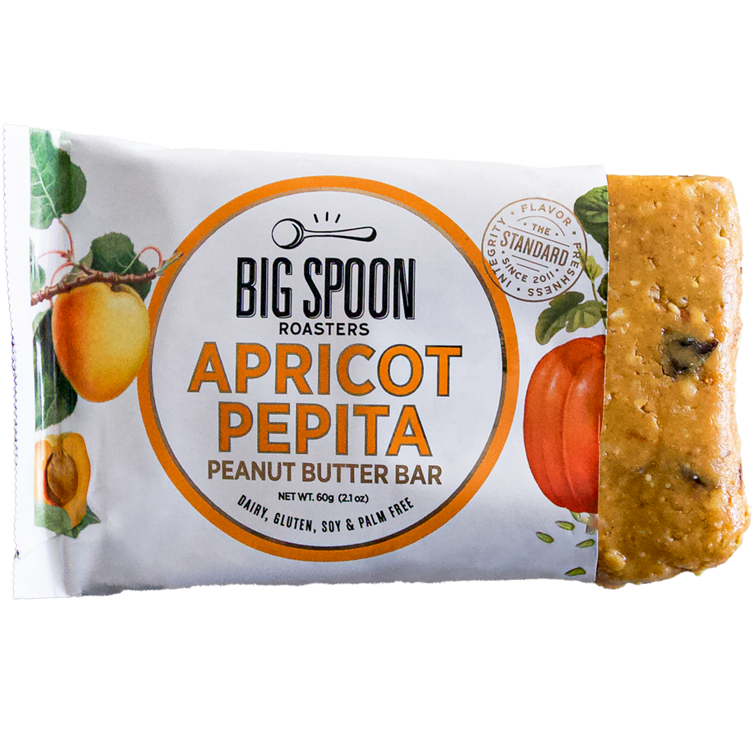 Apricot Pepita bar package, open on one side exposing bar