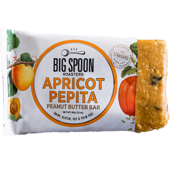 Apricot Pepita bar package, open on one side exposing bar