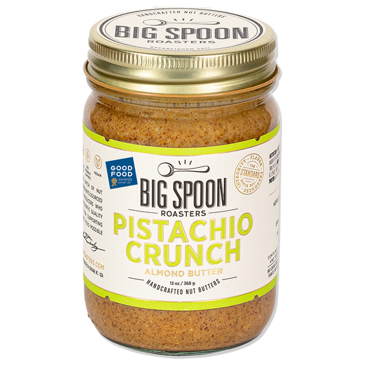 Jar of Pistachio Crunch Almond Butter on white background