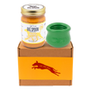 Jar of Vanilla Tater Wag Butter and a green West Paw Toppl toy on top of a gift box